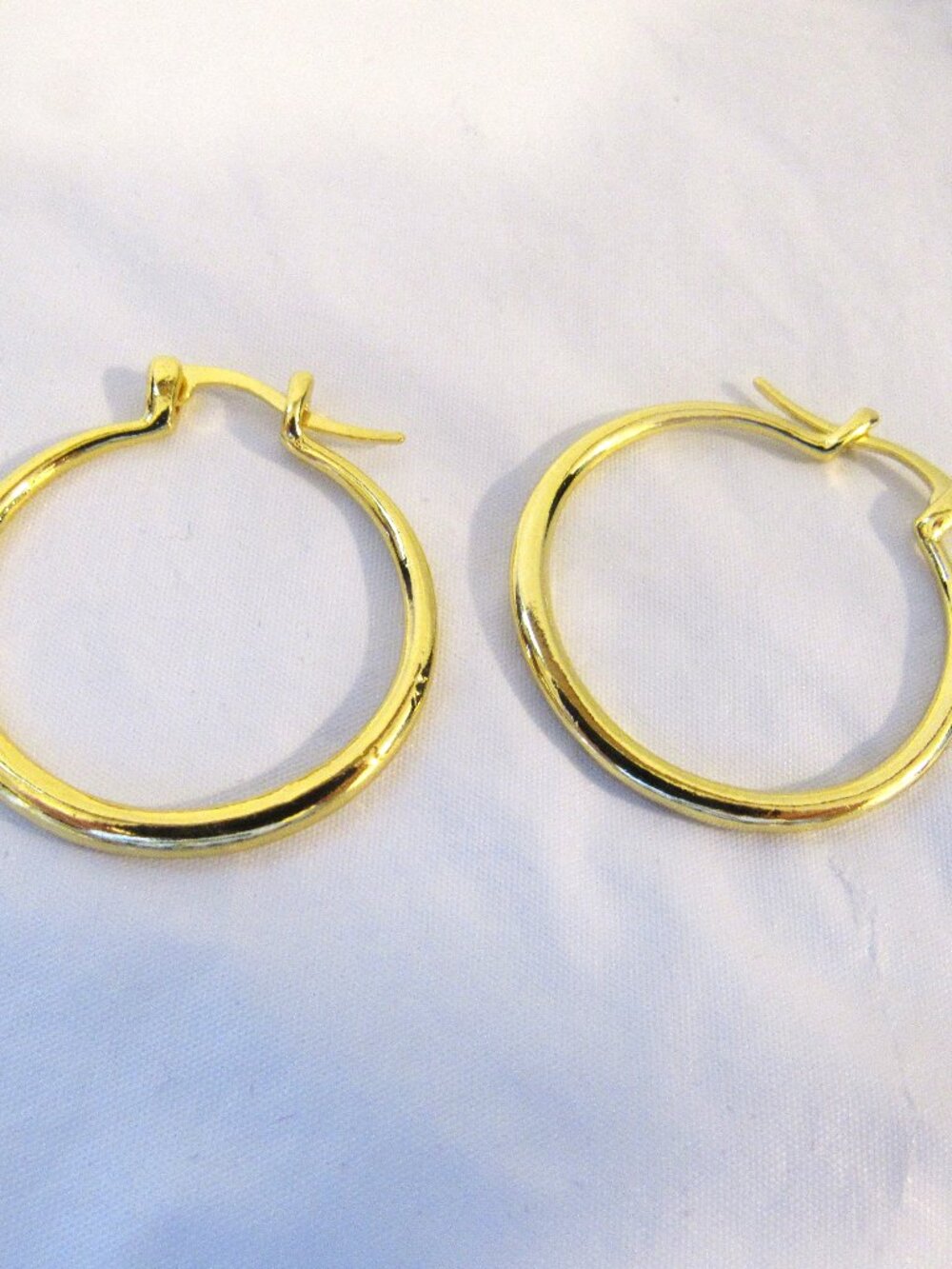 Gold Hoop Earrings.
